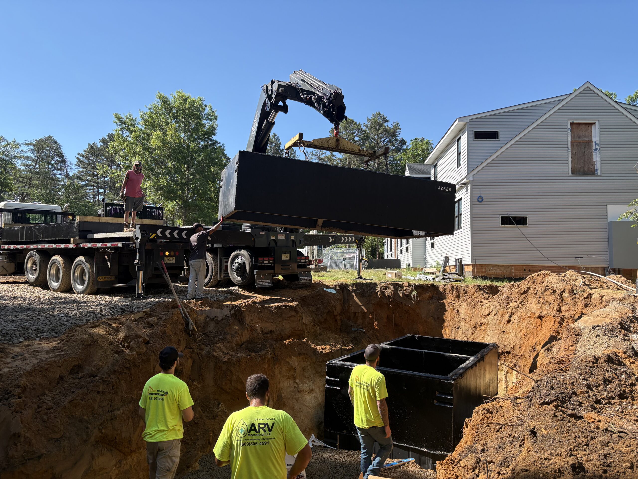 Mershon Concrete crew with tank on site